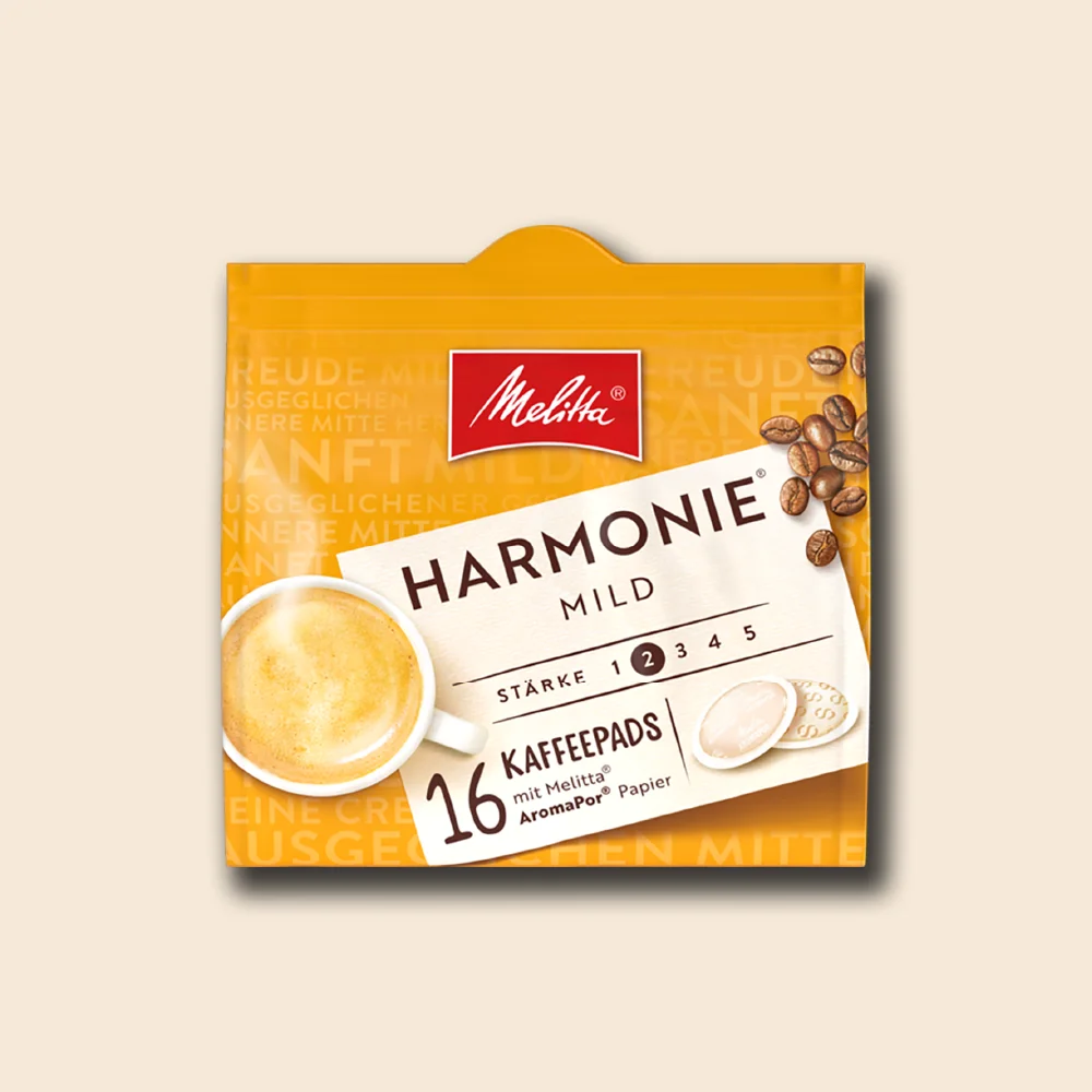 Produktbild der Melitta Harmonie Pads auf beigem Hintergrund