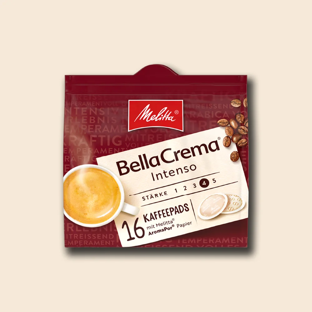 Produktbild der Melitta Intenso Pads auf beigem Hintergrund