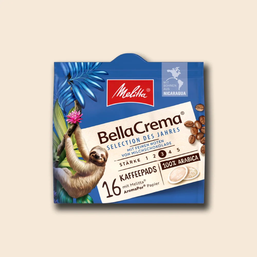 Produktbild der Melitta Selection of the year Pads auf beigem Hintergrund