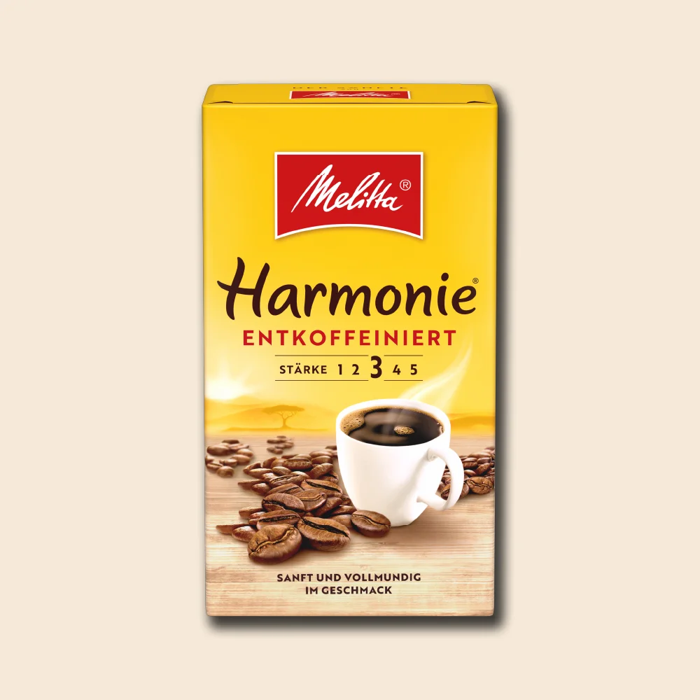 Image of a pack of Melitta Harmonie decaffeinated filter coffee on a beige background