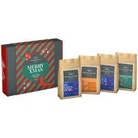 Verpackung vom Geschenkset der Melitta® Manufaktur, Aufschrift "Merry Xmas", daneben 4x 200g Tüten Kaffee