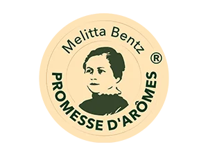 Logo Promesse d'arômes avec la photo de l'inventrice du filtre à café, Melitta