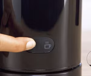 Image of a button to select cold or hot milk foam