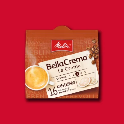 Melitta BellaCrema La Crema Kaffeepads Packung auf rotem Hintergrund