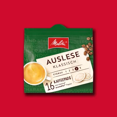 Melitta Auslese Kaffeepads Packung auf rotem Hintergrund