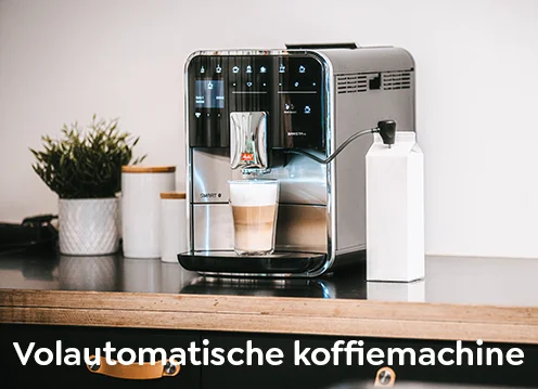 De Melitta volautomatische koffiemachine staat op een glazen tafel